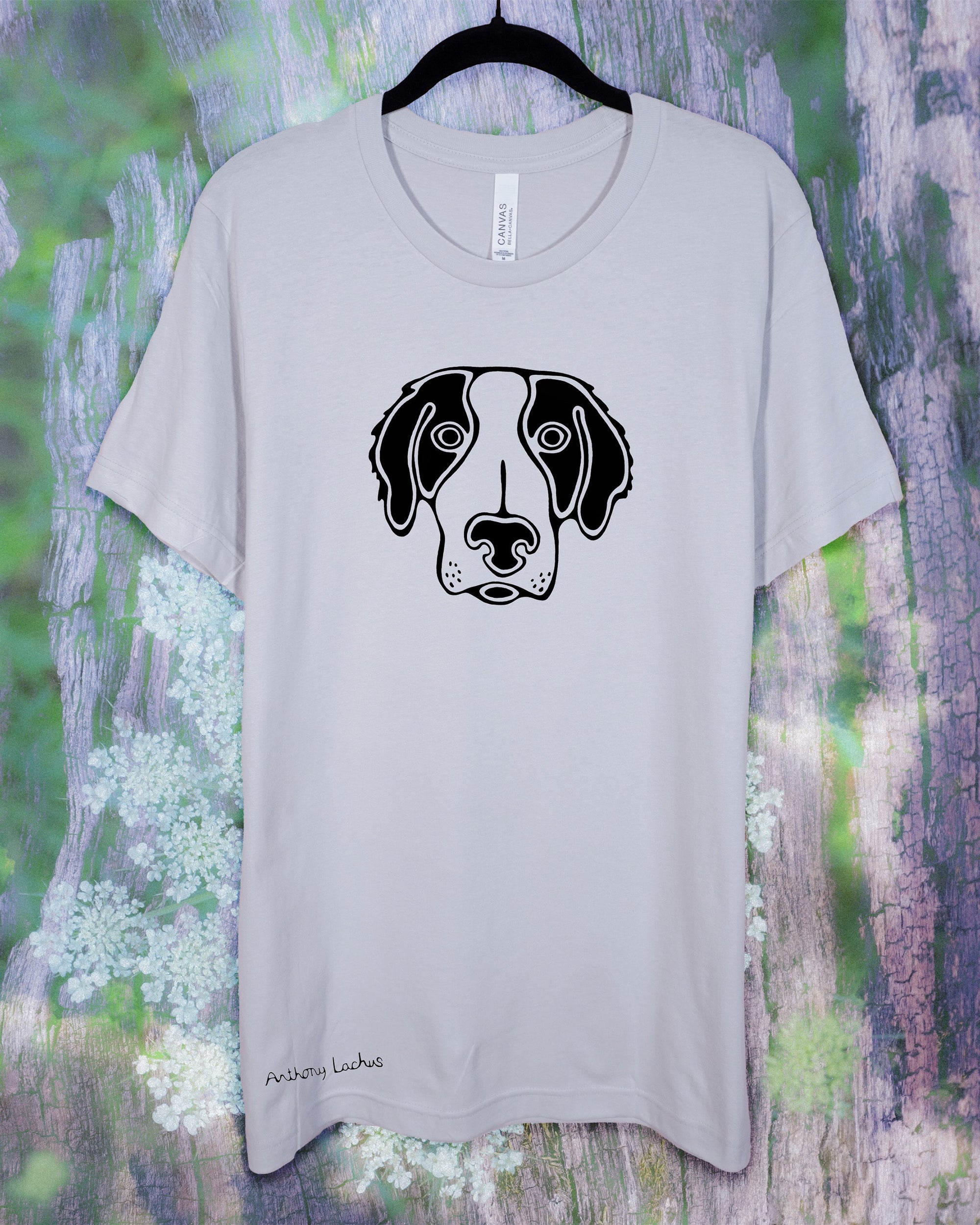 Gray t-shirt with a black dog graphic on a textured background