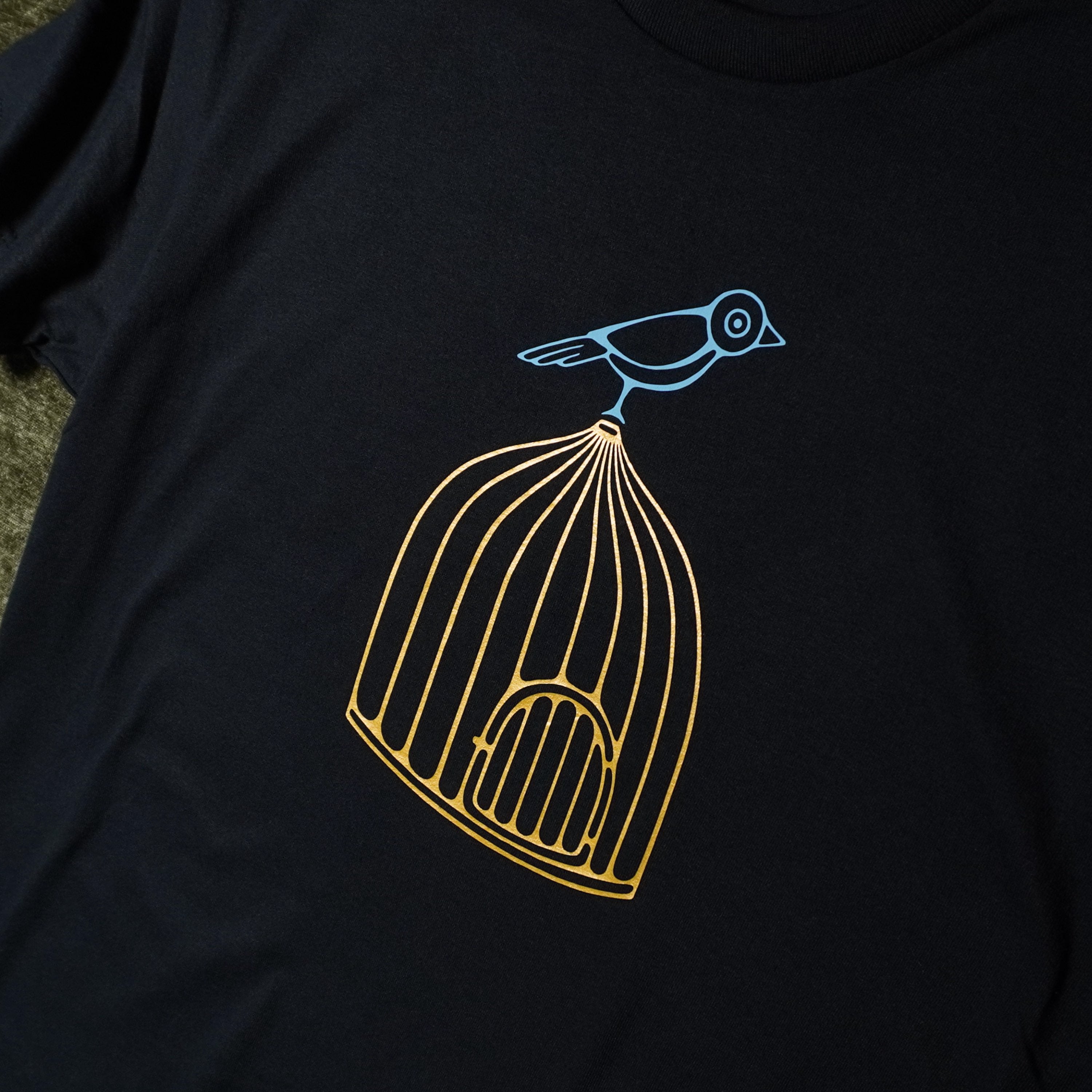 Bird On Cage