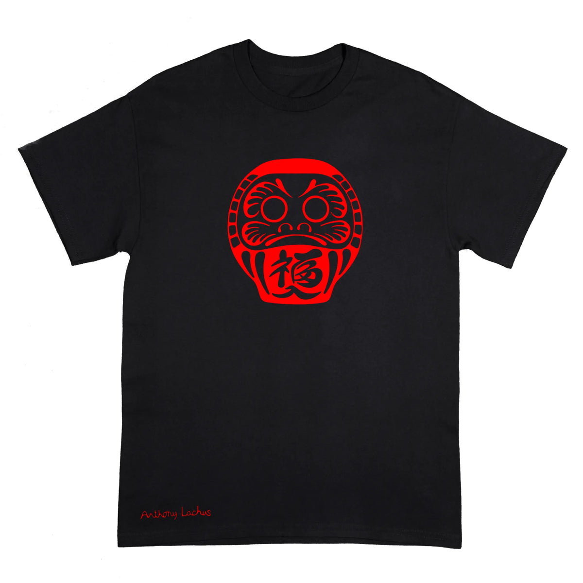 A black short-sleeve t-shirt with a red Daruma doll graphic on the chest and 'Anthony Lachus' printed in red near the bottom left, displayed on a solid white background.