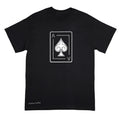 A black short-sleeve crewneck t-shirt with a white ace of spades line art graphic of on the chest, and a white signature reading 'Anthony Lachus' near the bottom left hem, displayed against a light background. An original, hand drawn artwork by Anthony Lachus. Front view.
