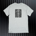 Abstract black image of fireworks on a light-gray t-shirt original hand drawn graphic tee design by Anthony Lachus