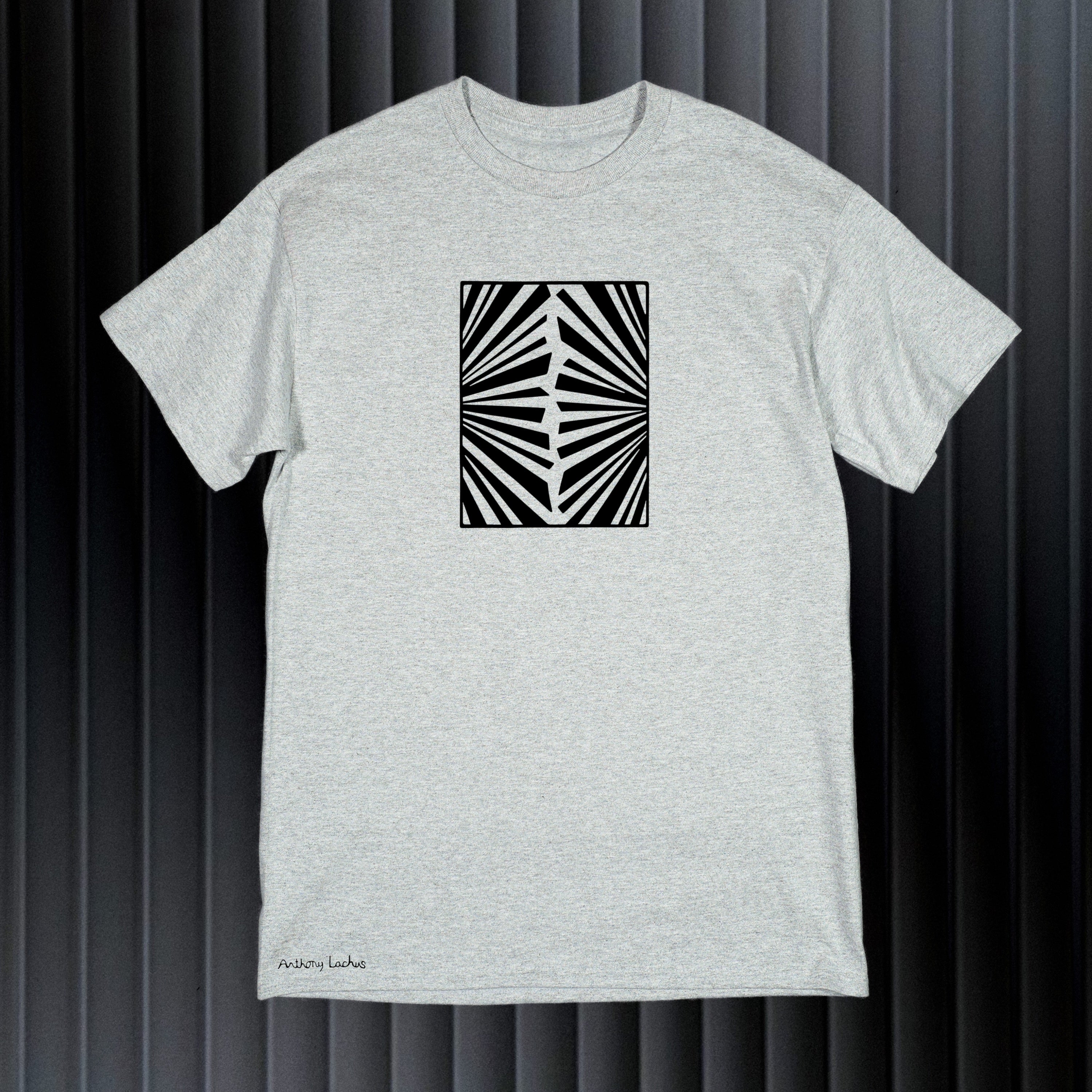 Abstract black image of fireworks on a light-gray t-shirt original hand drawn graphic tee design by Anthony Lachus