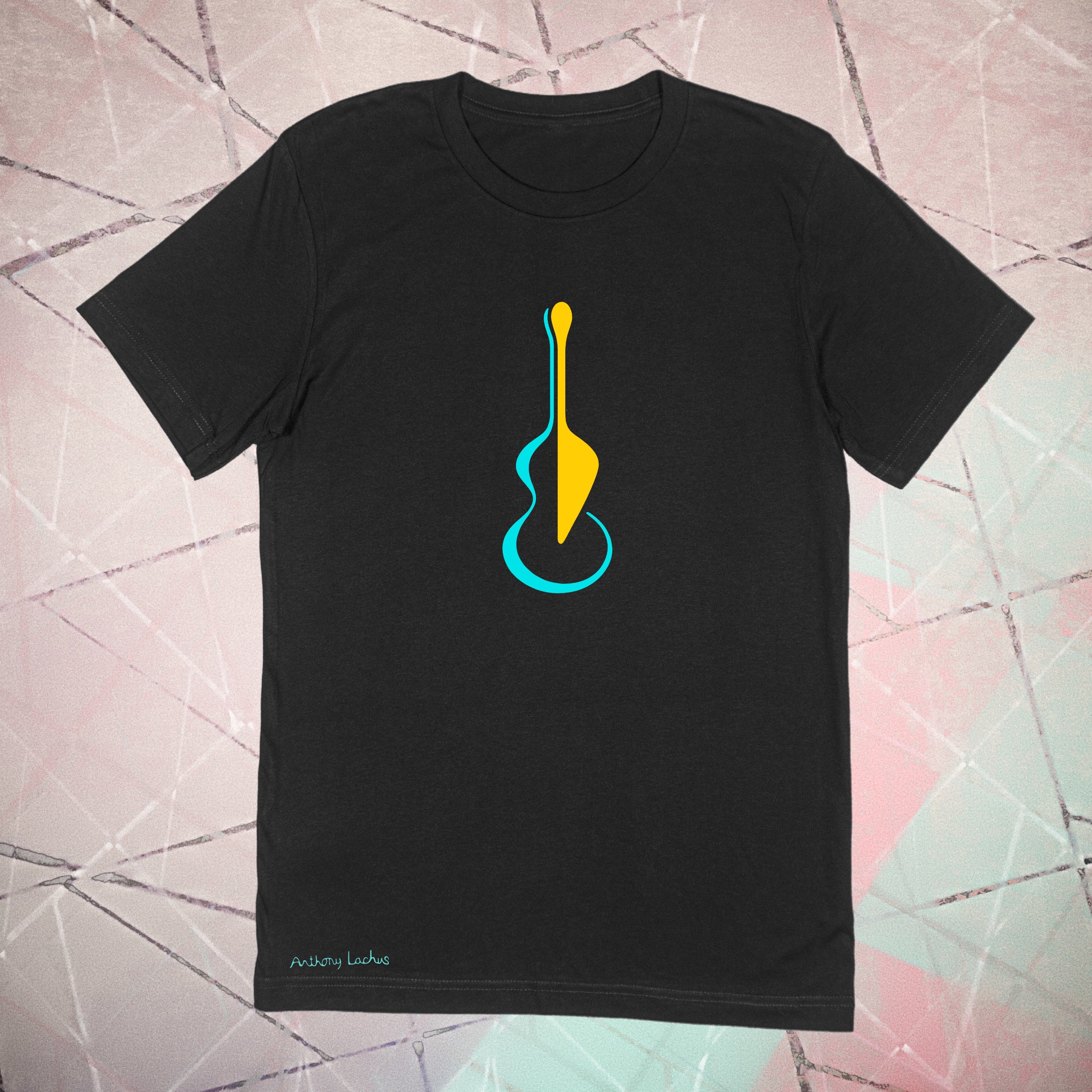 Black t-shirt with a colorful guitar graphic on a geometric patterned background