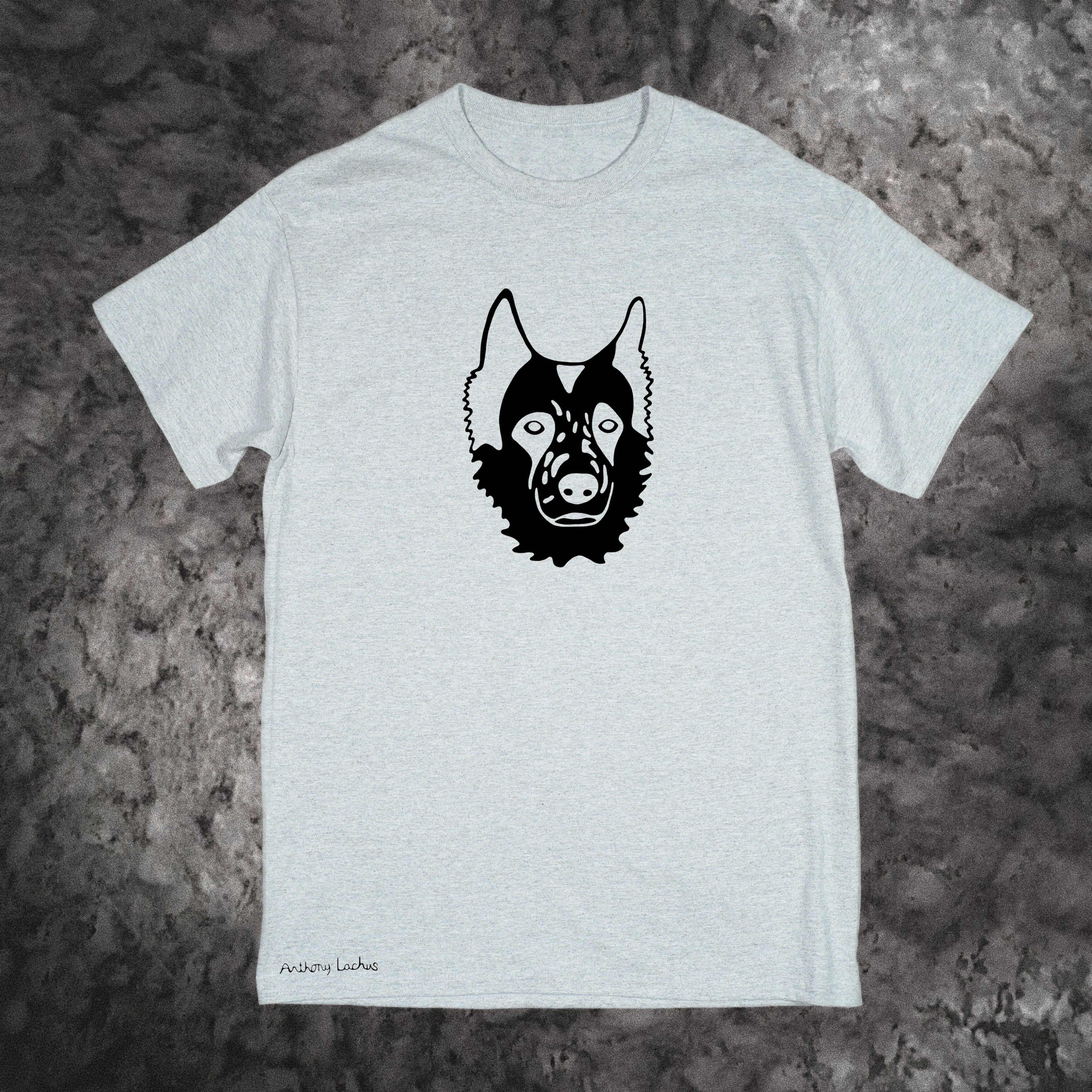 Black image of a dog on a premium light-gray cotton t-shirt original hand drawn graphic tee design by Anthony Lachus