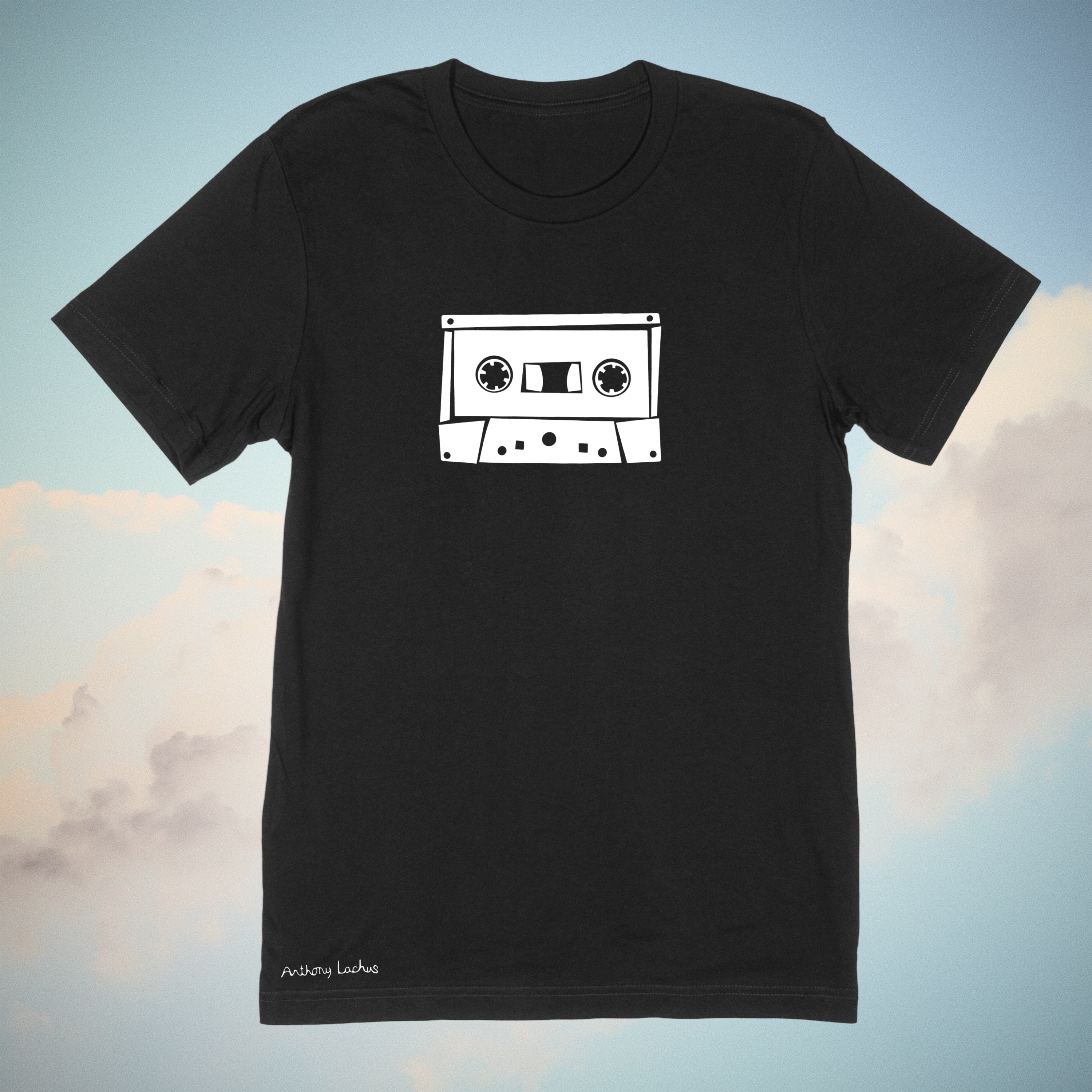 White music cassette image on a premium cotton black t-shirt original hand drawn graphic tee design by Anthony Lachus