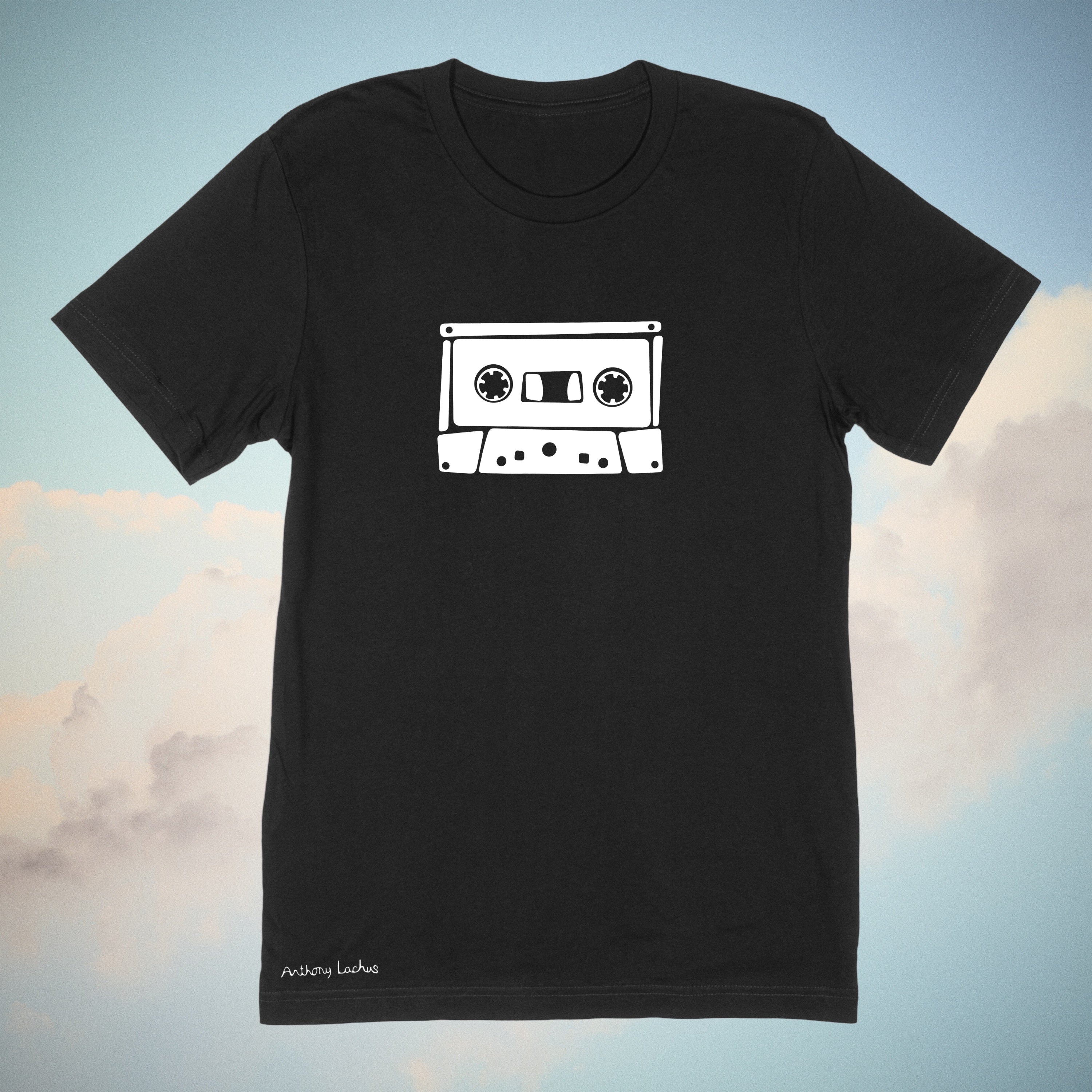 White music cassette image on a premium cotton black t-shirt original hand drawn graphic tee design by Anthony Lachus