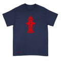 A navy blue short-sleeve t-shirt with a red graphic of a fire hydrant on the chest and 'Anthony Lachus' printed in red near the bottom left hem, shown on a plain white background.