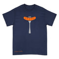 A navy blue short-sleeve t-shirt with a graphic of a grilled orange sausage on a silver fork on the chest, and the text 'Anthony Lachus' printed in orange near the bottom left.