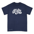 A navy blue short-sleeve crewneck t-shirt with a white “who knows” stylized line art graphic of on the chest, and a white signature reading 'Anthony Lachus' near the bottom left hem, displayed against a light background. An original, hand drawn artwork by Anthony Lachus. Front view.