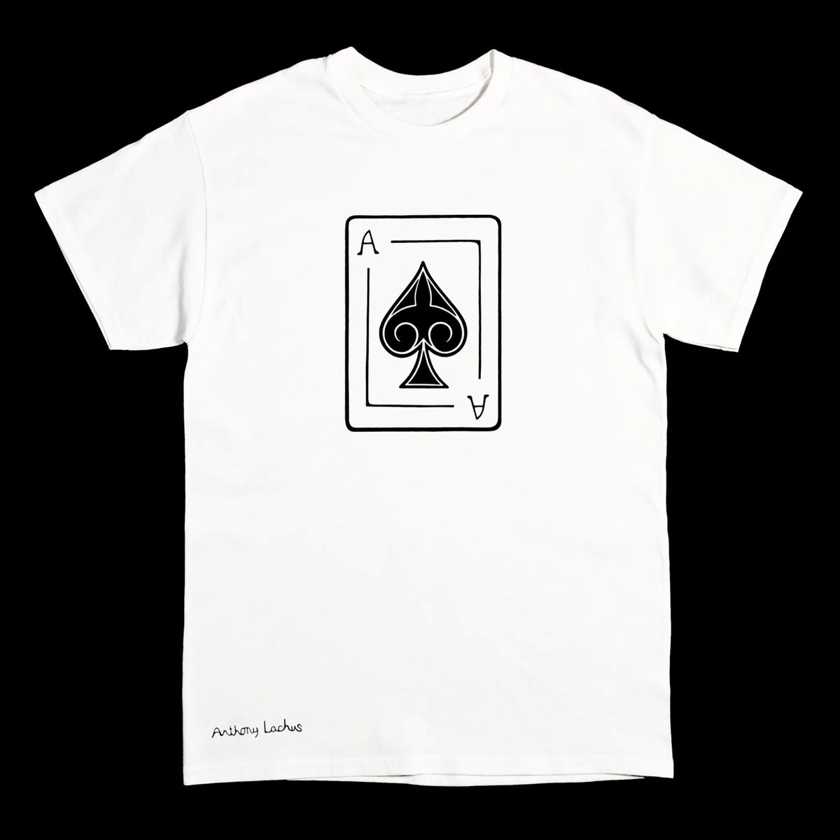 A white short-sleeve crewneck t-shirt with a black ace of spades line art graphic of on the chest, and a black signature reading 'Anthony Lachus' near the bottom left hem, displayed against a dark background. An original, hand drawn artwork by Anthony Lachus. Front view.