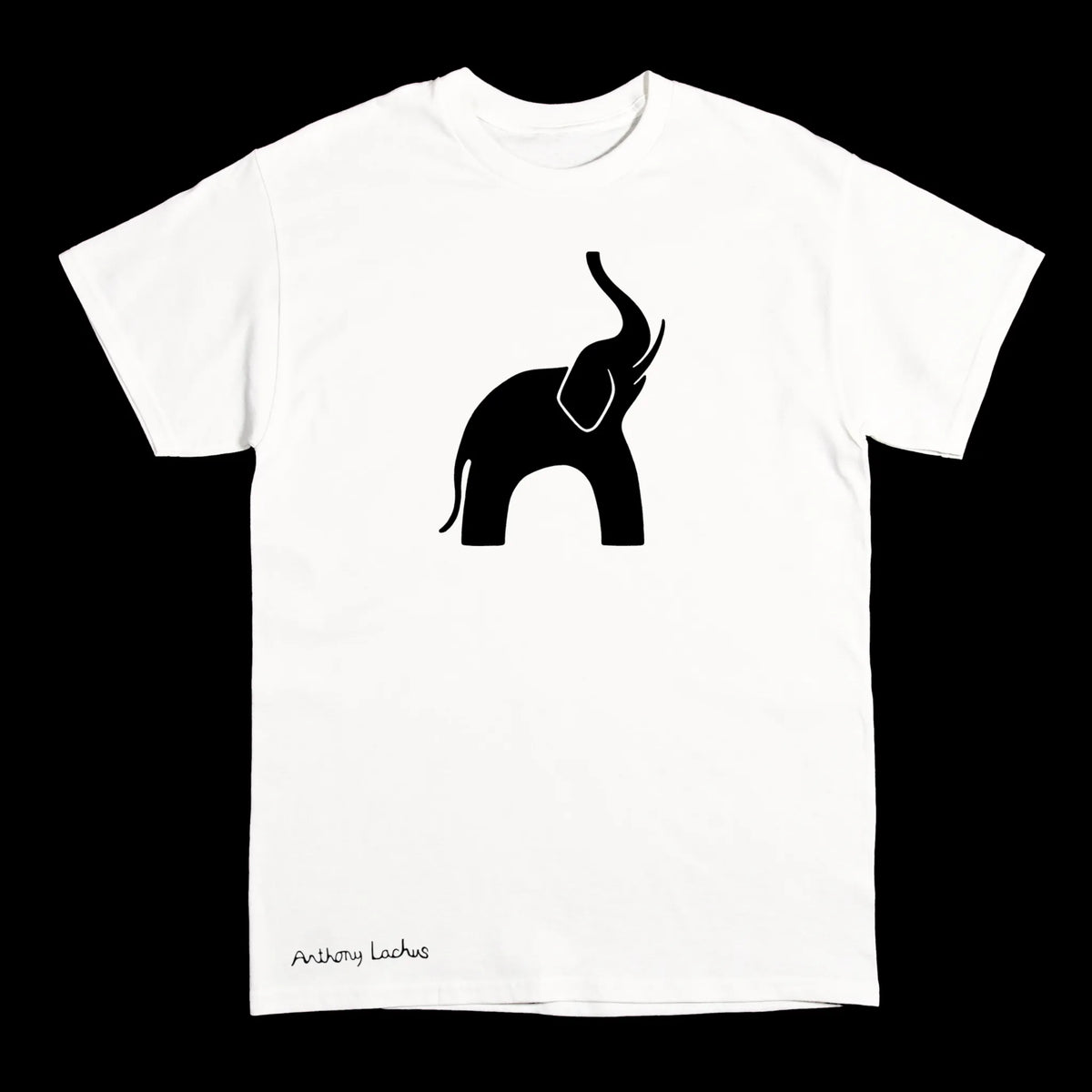 A white short-sleeve crewneck t-shirt featuring a black silhouette graphic of an elephant on the chest and the artists signature near the bottom hem, displayed against a solid black background.